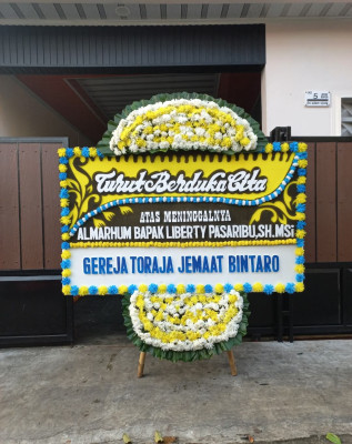 Papan Bunga Duka di Wampu